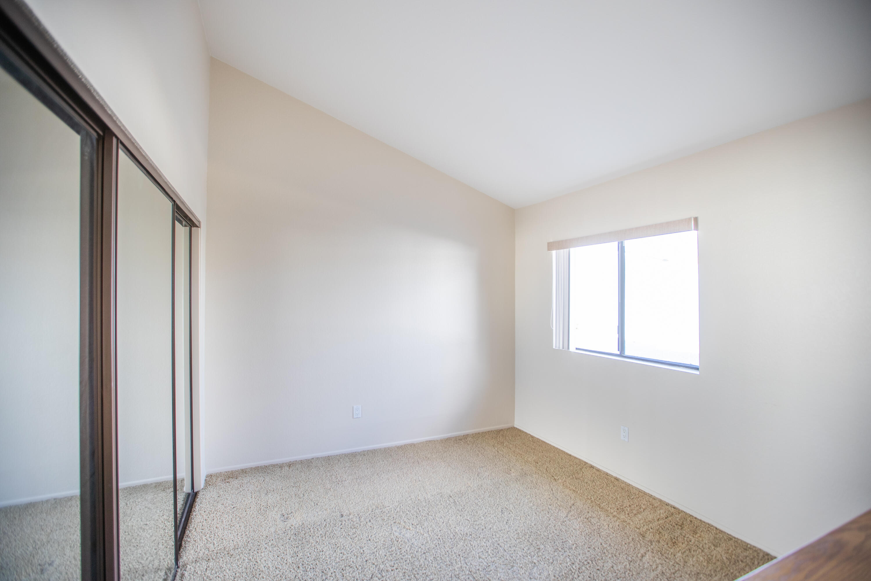 15261 Leffingwell Road, Unit 3 Whittier, CA 90604 - Photo 26 of 33 an empty room with windows