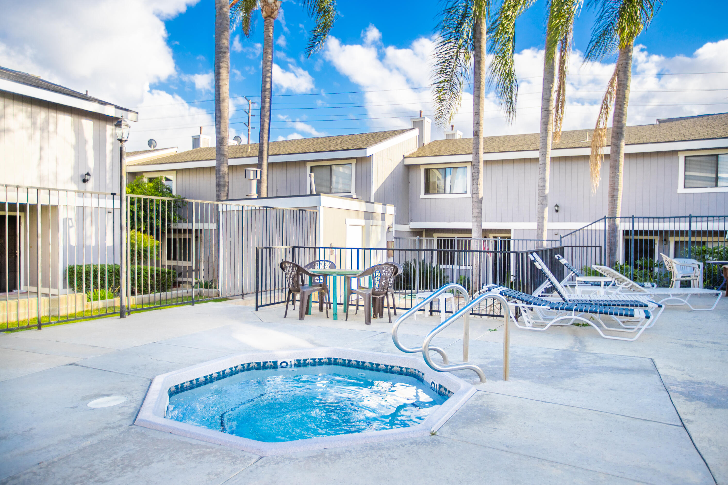 15261 Leffingwell Road, Unit 3 Whittier, CA 90604 - Photo 32 of 33 a view of a house with a swimming pool and sitting area