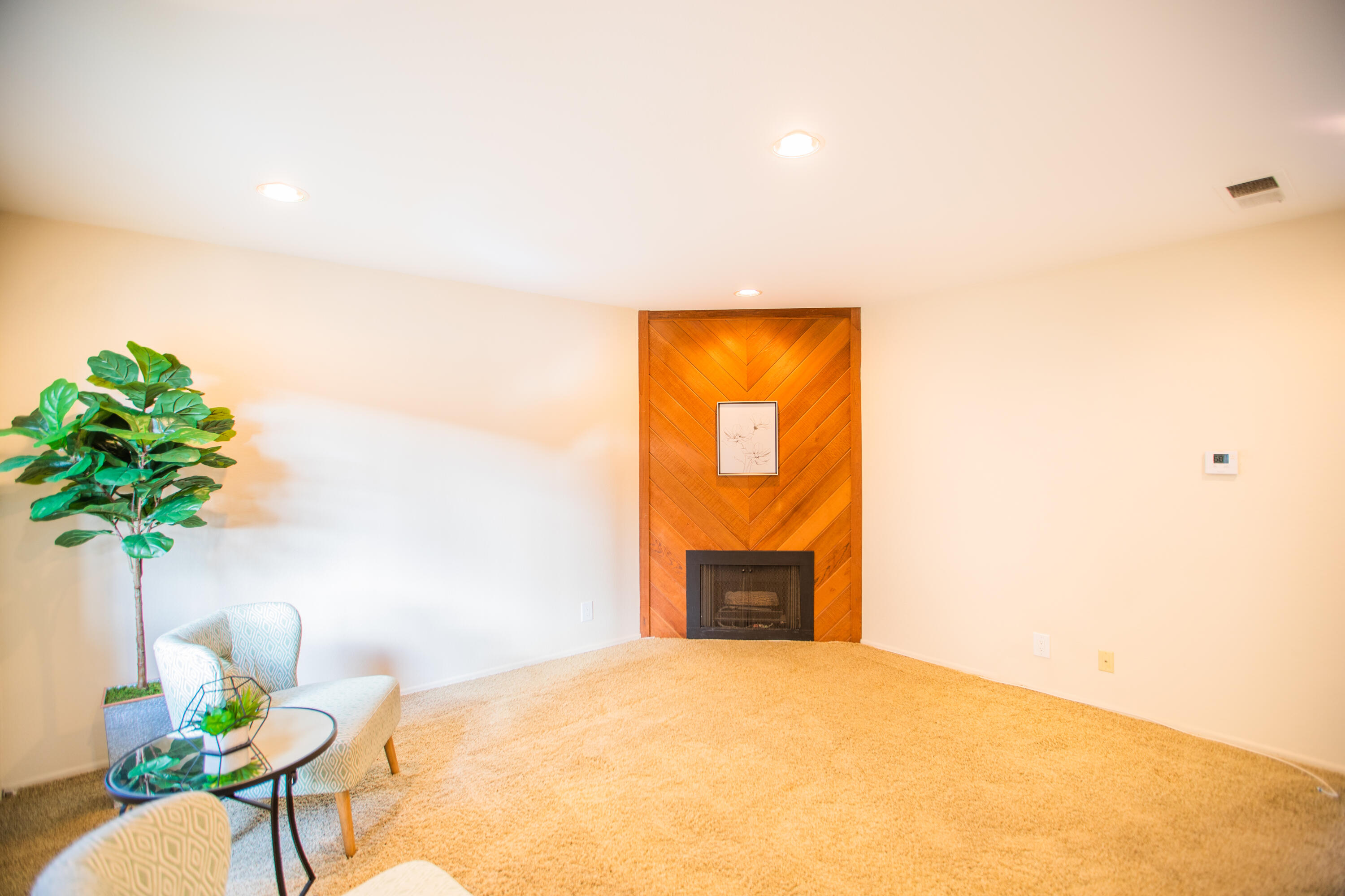 15261 Leffingwell Road, Unit 3 Whittier, CA 90604 - Photo 9 of 33 a bedroom with a bed and a potted plant