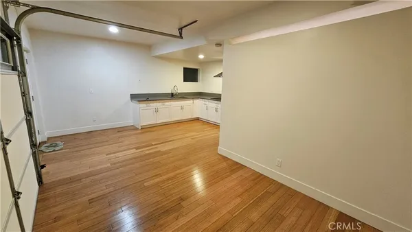 a bedroom with a bed and a chair