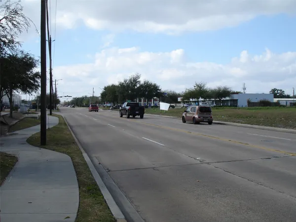 a view of a road with a play ground