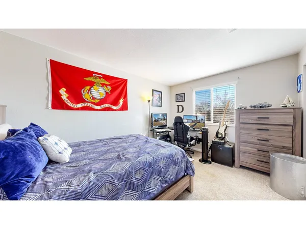 a bedroom with a bed and furniture