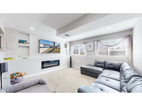 a living room with furniture and a couch