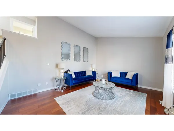 a living room with furniture and a couch