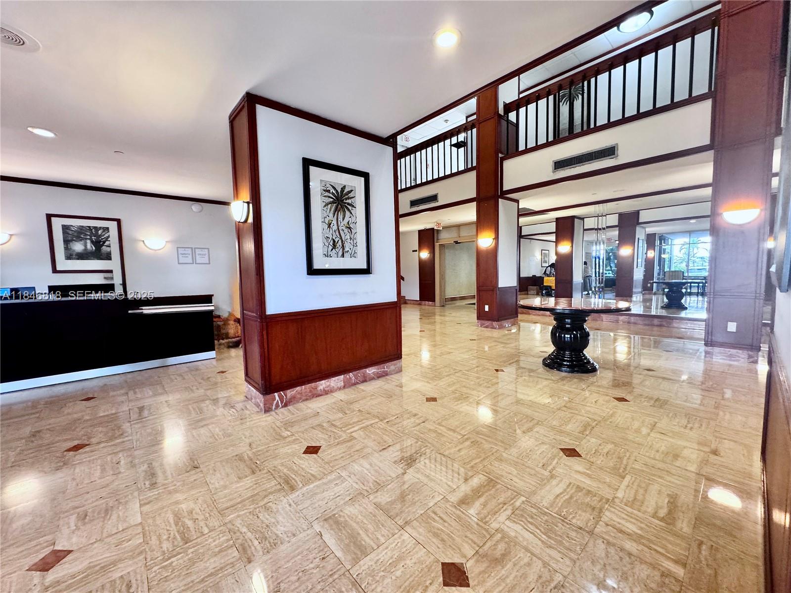 2851 Northeast 183rd Street, Unit 1508E Aventura, FL 33160 - Photo 19 of 27 a view of livingroom with furniture and a rug