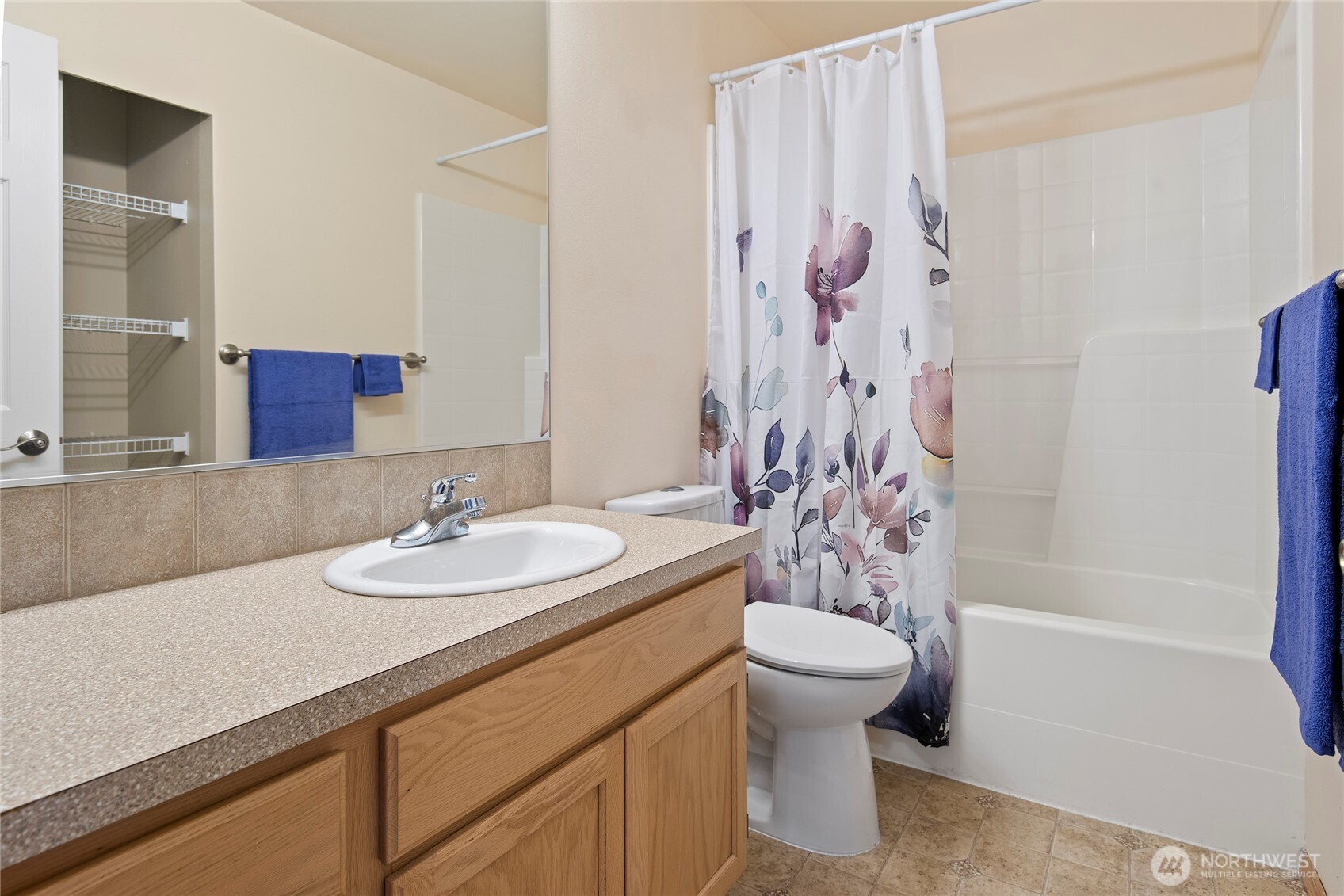 4023 160th Place Southeast Bothell, WA 98012 - Photo 18 of 22 a bathroom with a sink a toilet and shower