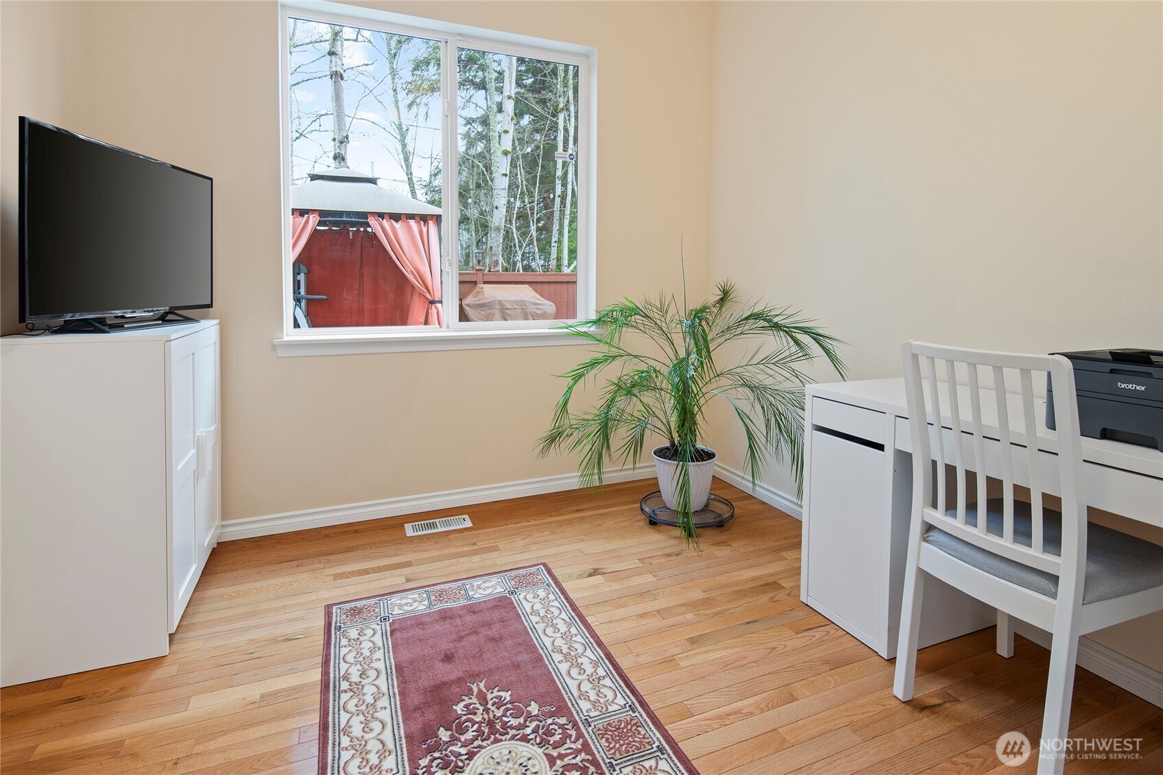 4023 160th Place Southeast Bothell, WA 98012 - Photo 5 of 22 a living room with furniture and a flat screen tv