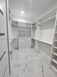 a view of a walk in closet