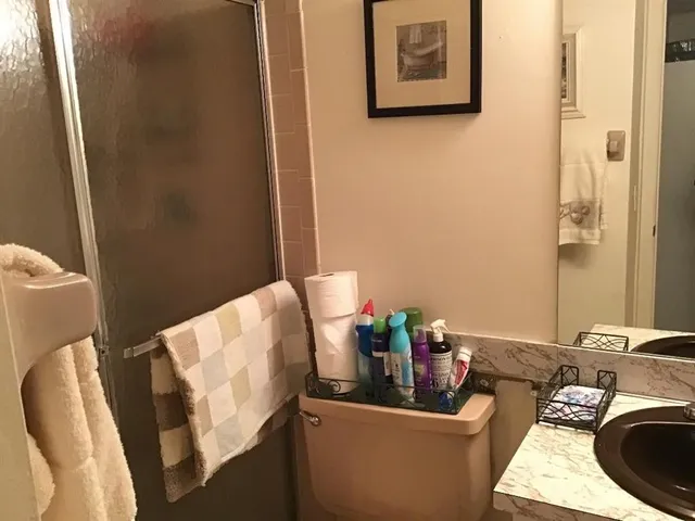 a view of hallway with windows