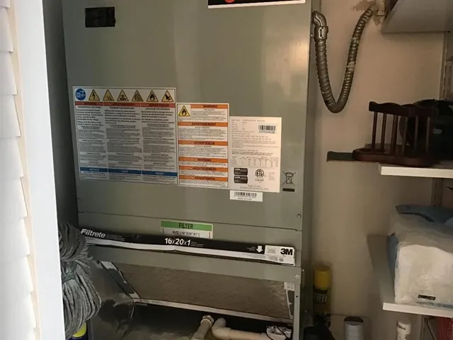 a view of a cars park in front of a building