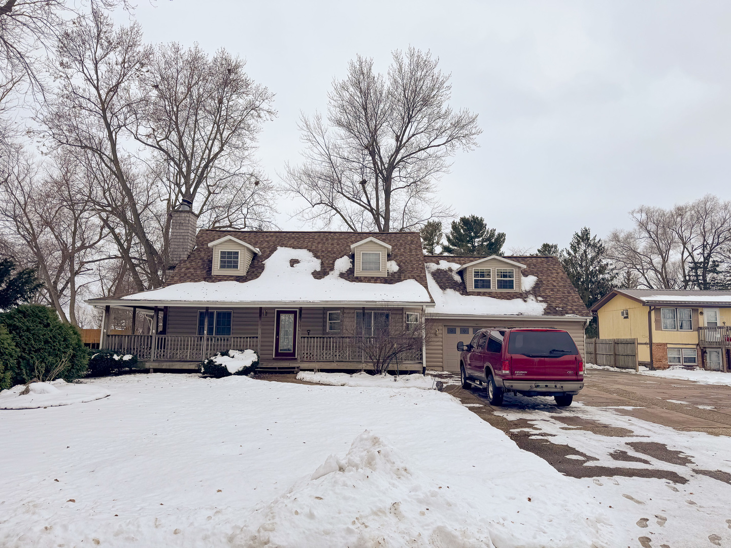206 Boyd Avenue Amboy, IL 61310 - Photo 2 of 44 a view of a car parked in front of a houses