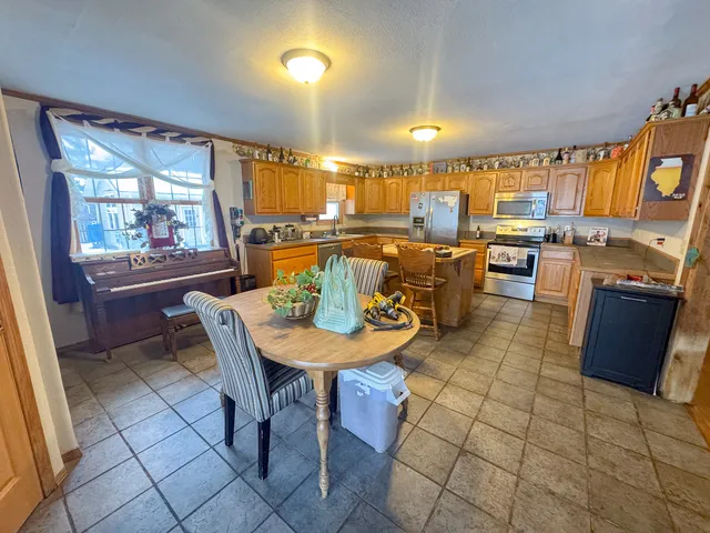a view of a dining room with furniture