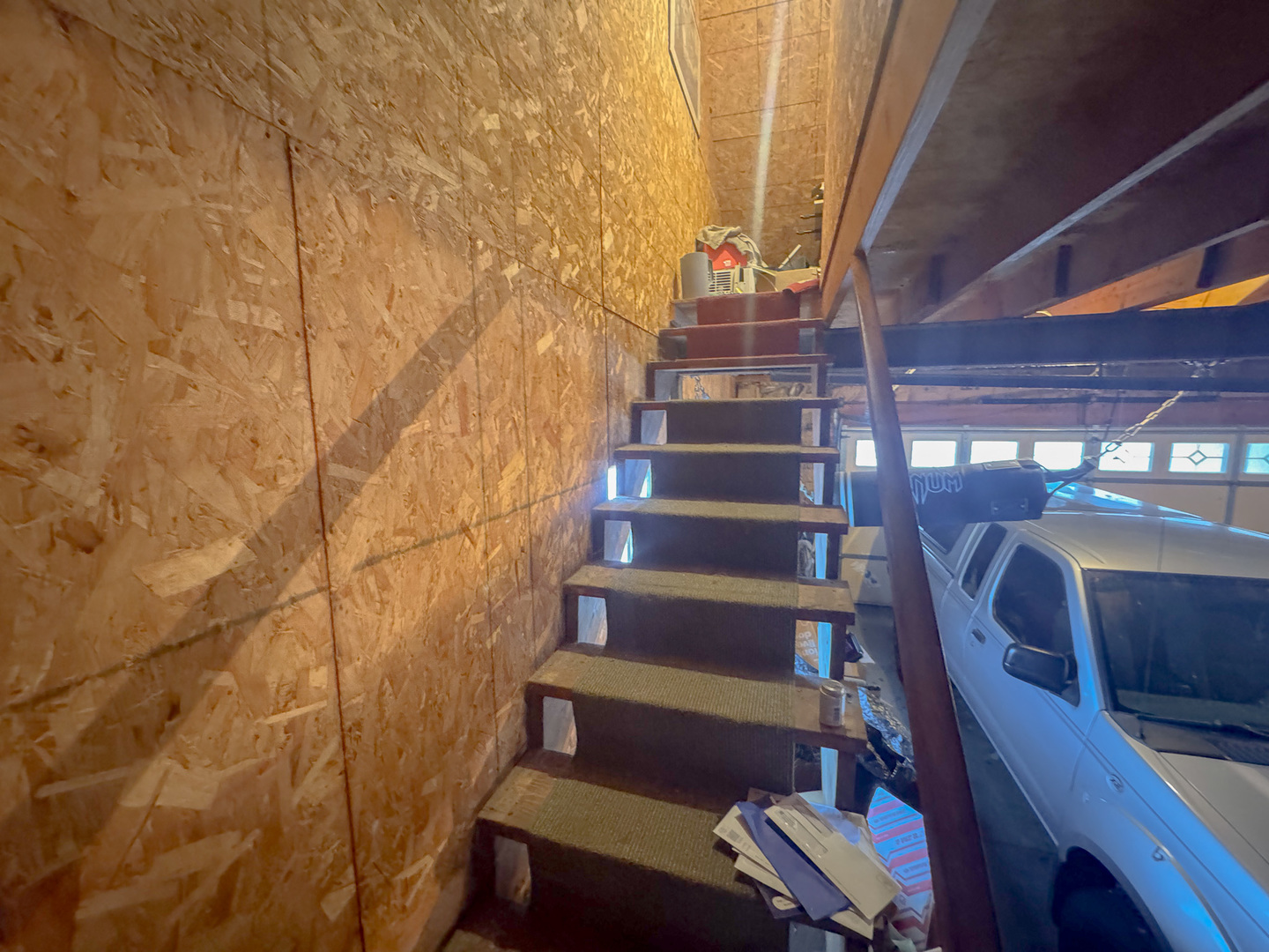 206 Boyd Avenue Amboy, IL 61310 - Photo 44 of 44 a view of staircase with wooden door and chair