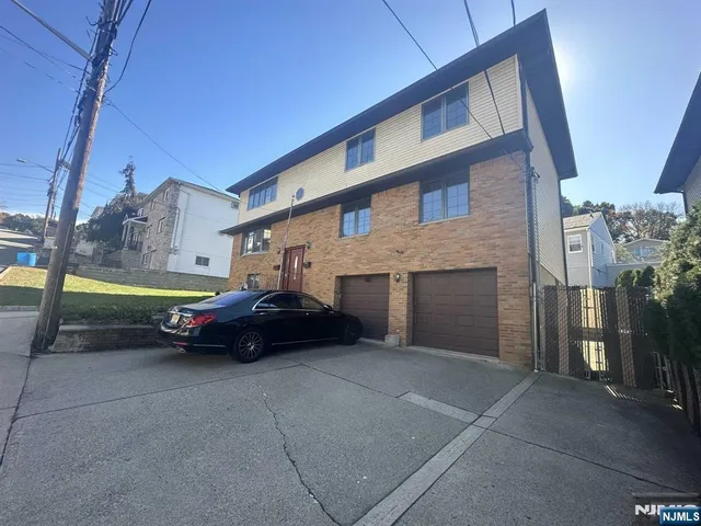 a view of a car parked in front of a building