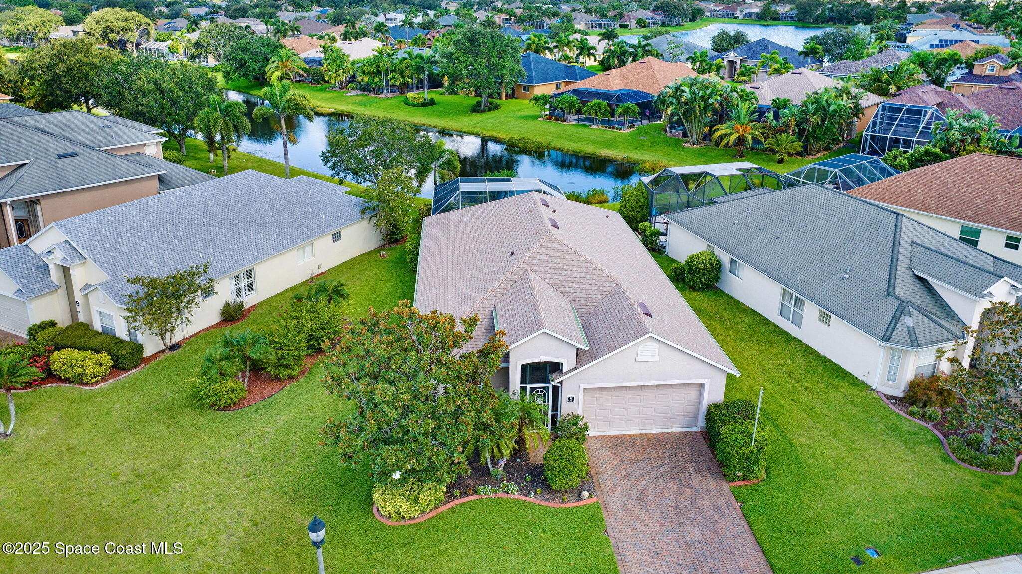 4311 Chardonnay Drive Rockledge, FL 32955 - Photo 1 of 54 DJI_20250716101153_0019_D