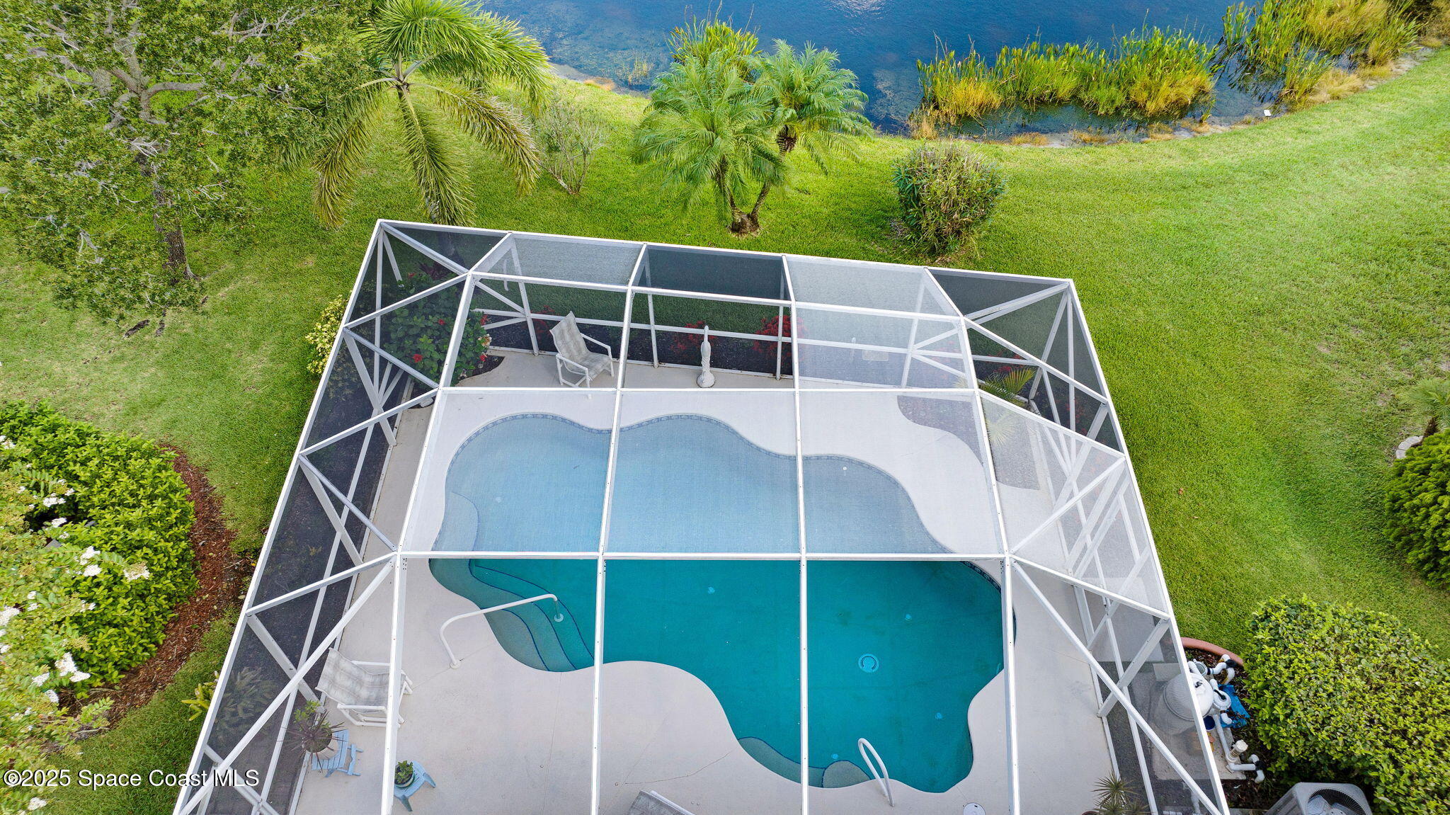 4311 Chardonnay Drive Rockledge, FL 32955 - Photo 14 of 54 DJI_20250716101240_0028_D