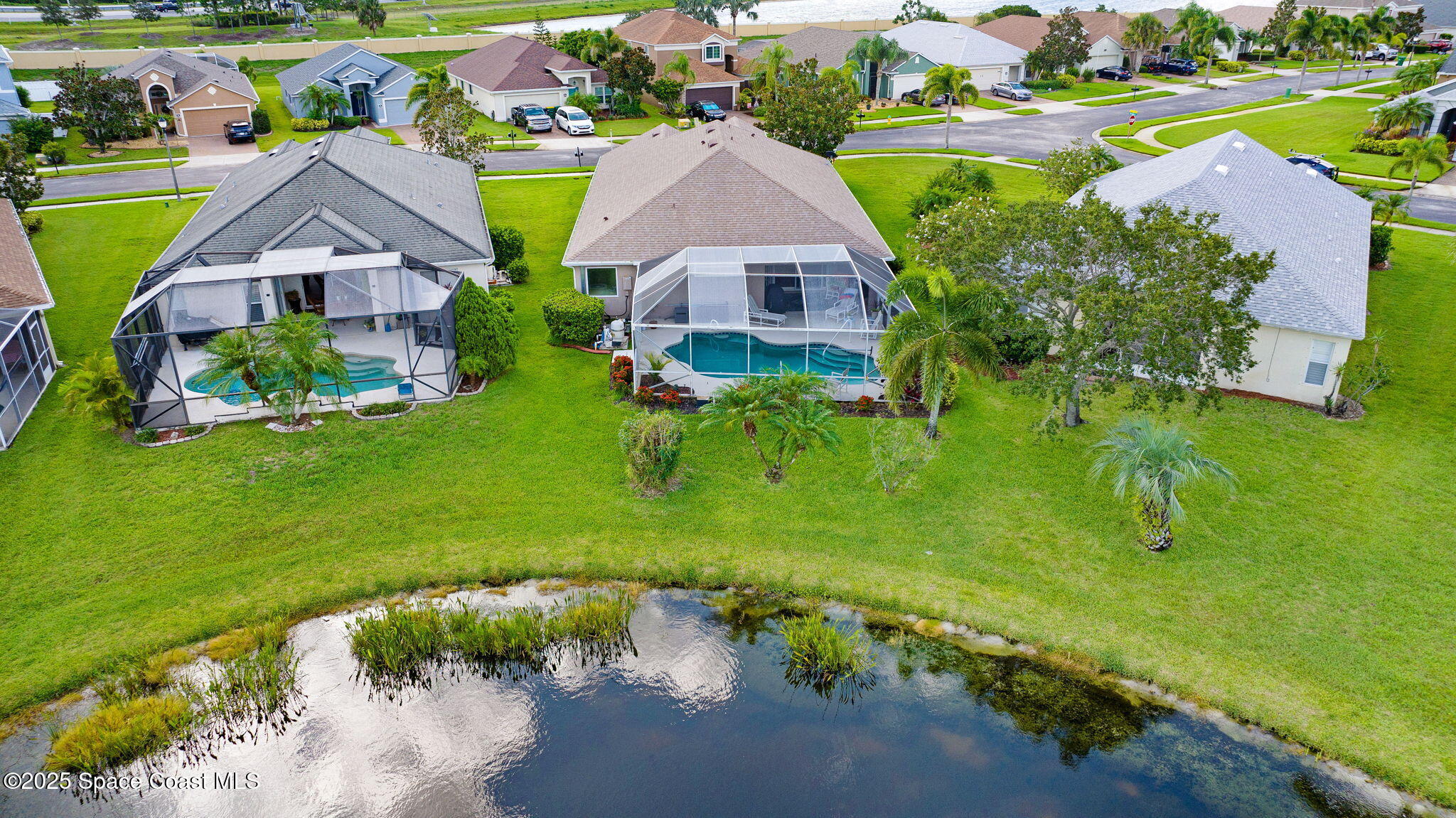 4311 Chardonnay Drive Rockledge, FL 32955 - Photo 50 of 54 DJI_20250716101554_0041_D