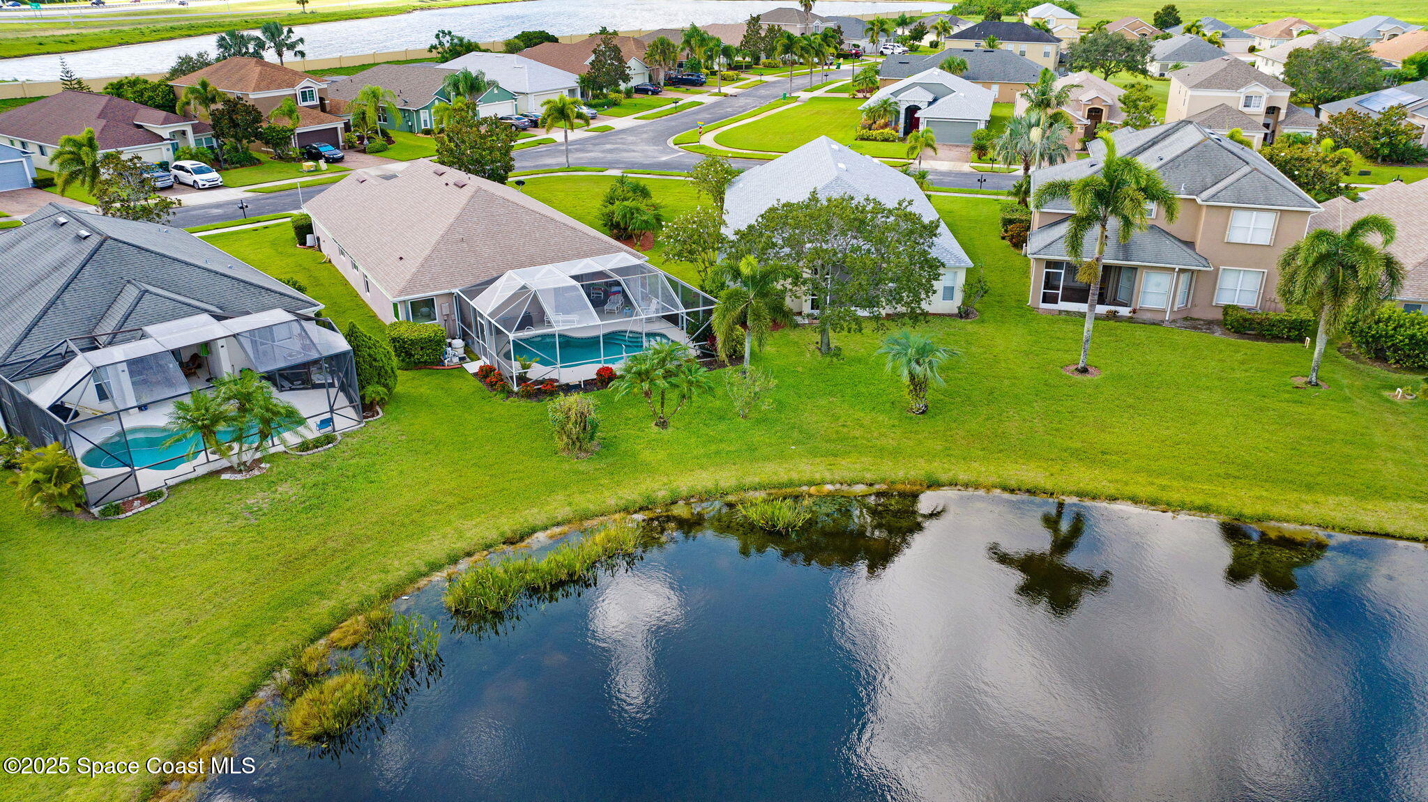 4311 Chardonnay Drive Rockledge, FL 32955 - Photo 51 of 54 DJI_20250716101617_0047_D