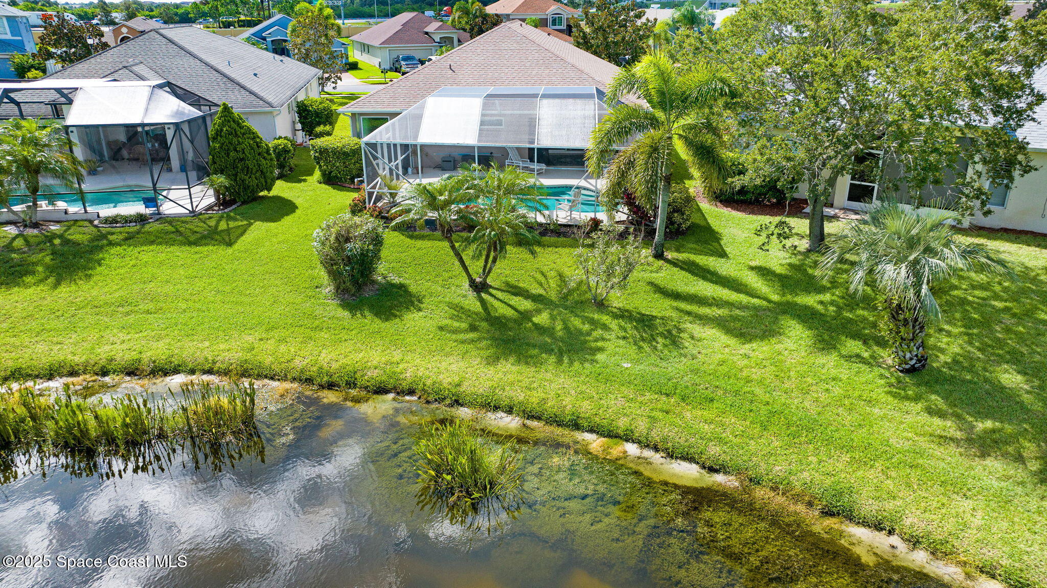 4311 Chardonnay Drive Rockledge, FL 32955 - Photo 52 of 54 DJI_20250716101717_0053_D