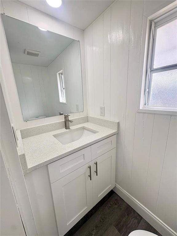 35004 Hawkiowa Road Dade City, FL 33523 - Photo 16 of 28 a bathroom with a sink and a mirror