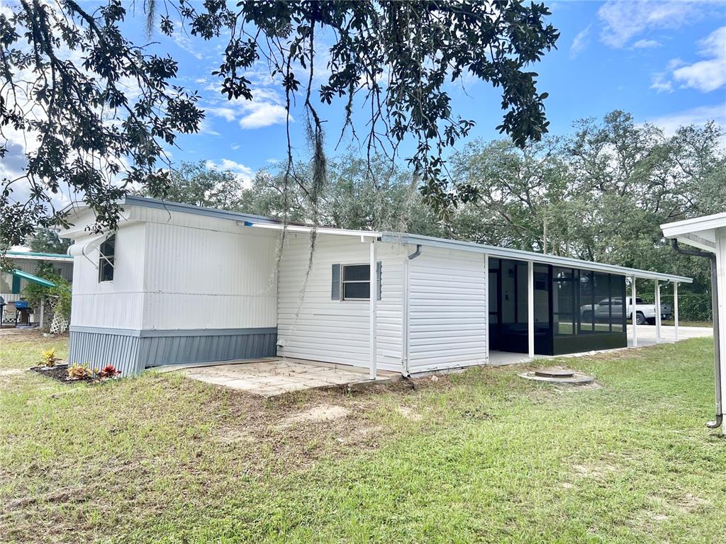 35004 Hawkiowa Road Dade City, FL 33523 - Photo 24 of 28 a view of a backyard