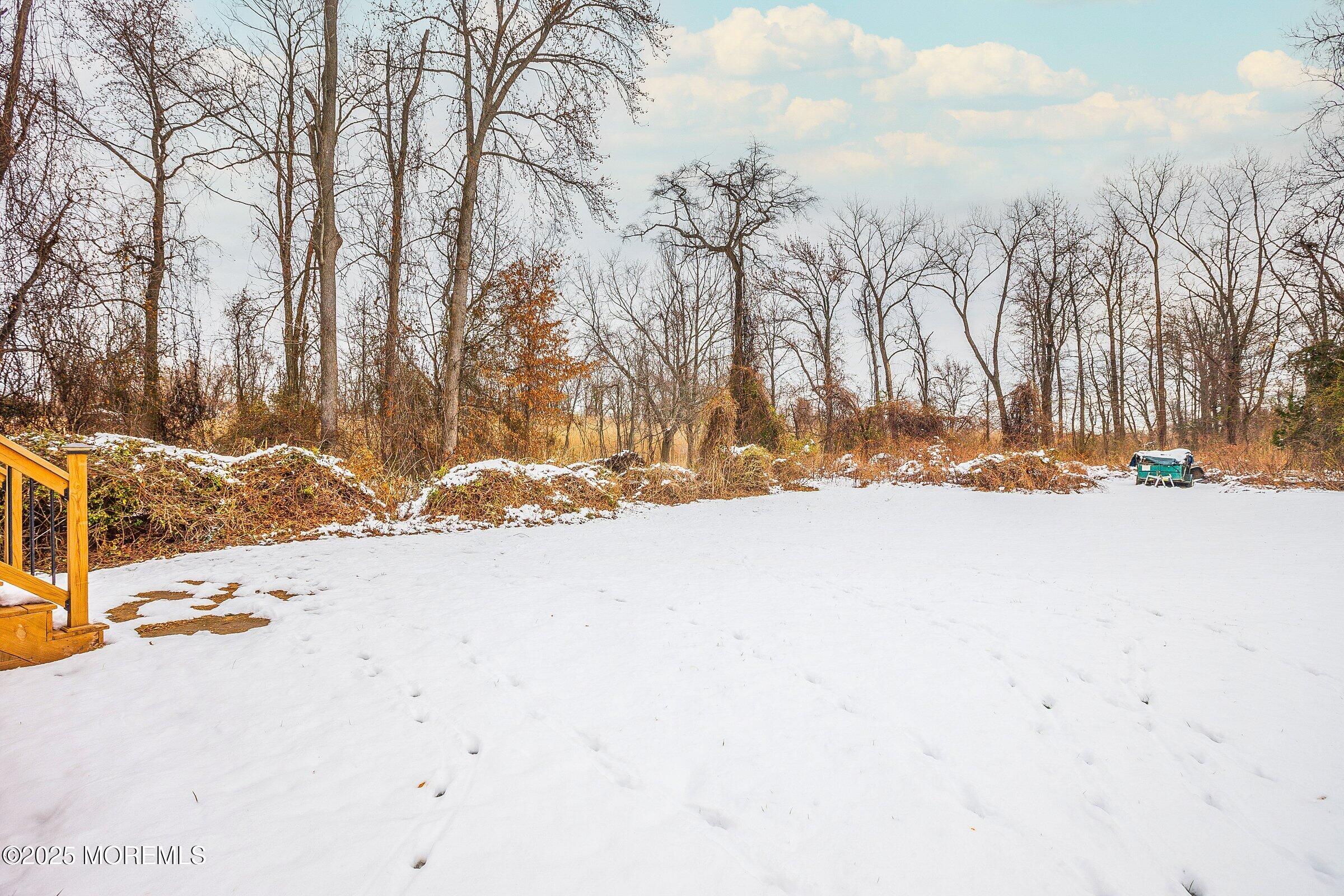 119 E Road Belford, NJ 07718 - Photo 19 of 21 a view of snow on the road