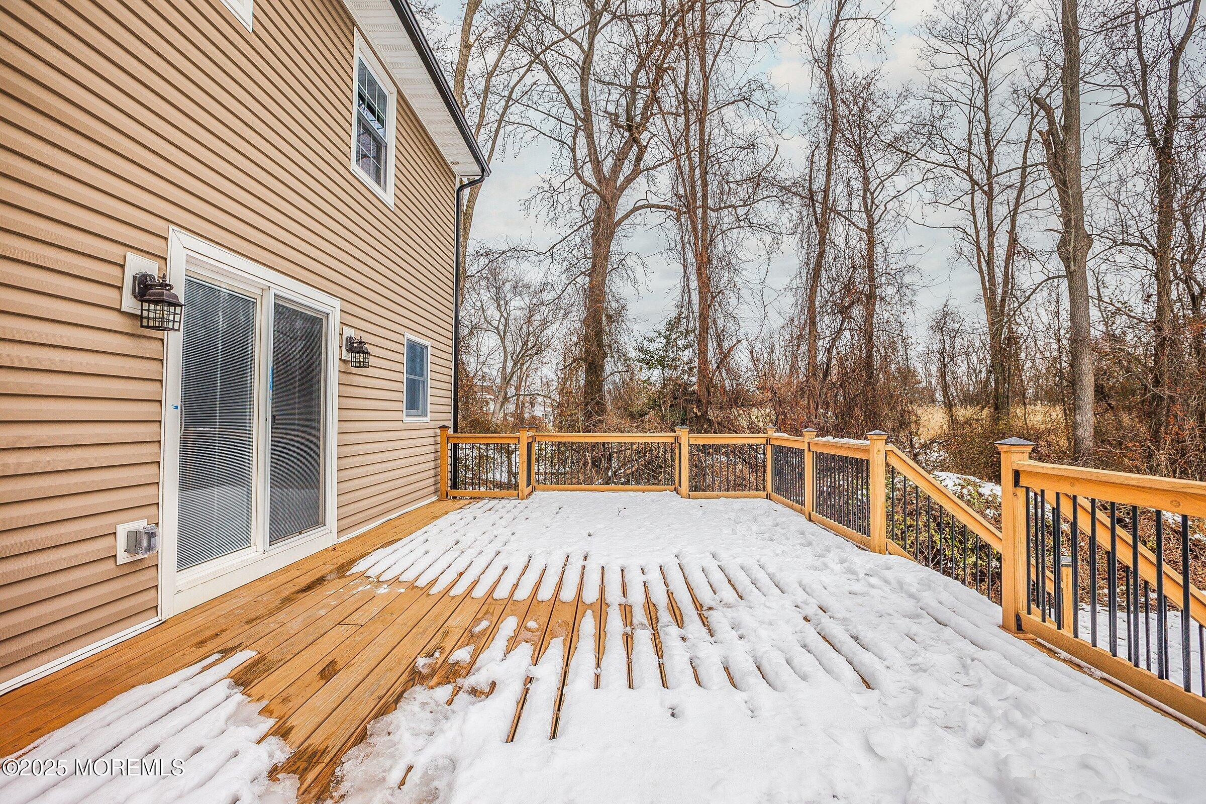 119 E Road Belford, NJ 07718 - Photo 20 of 21 a view of a house with backyard and trees