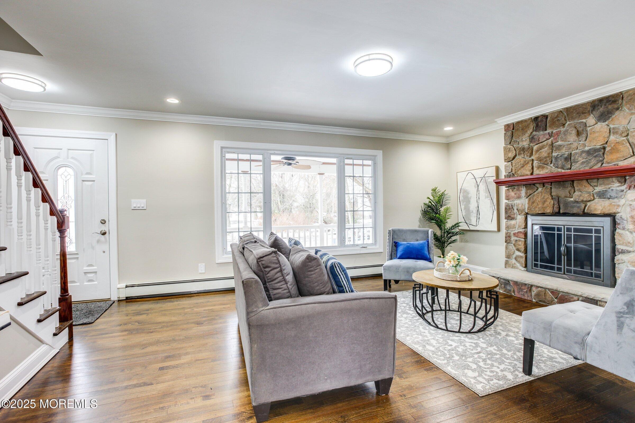 119 E Road Belford, NJ 07718 - Photo 3 of 21 a living room with furniture large window and wooden floor