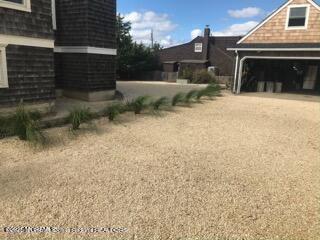 10 E Street Seaside Park, NJ 08752 - Photo 19 of 26 a view of a house with a outdoor space