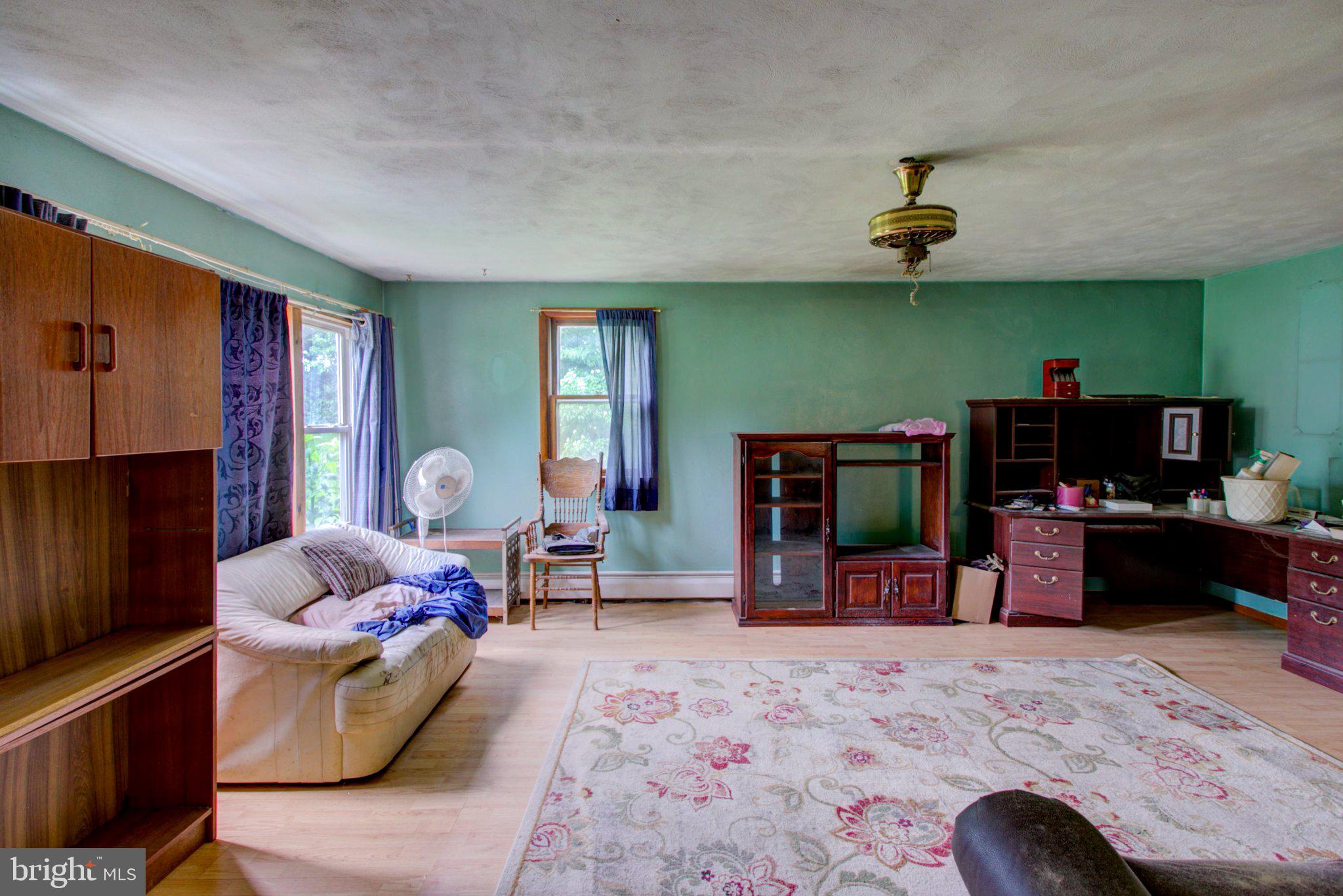 1406 Richmond Road Red Lion, PA 17356 - Photo 5 of 41 Spacious room with vibrant green walls.