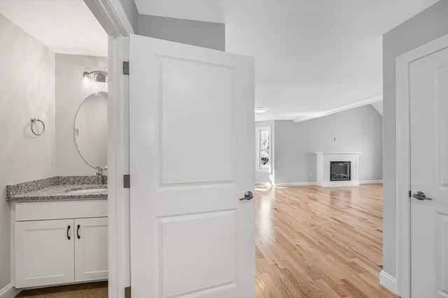 a view of a kitchen from the hallway