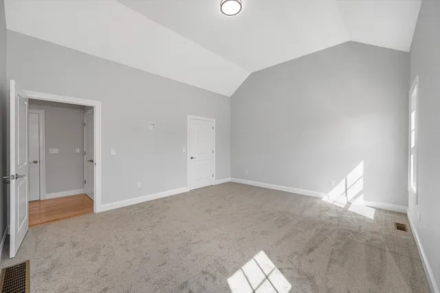 a view of an empty room and window