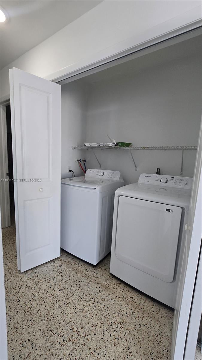 3312 Southwest 24th Terrace Miami, FL 33145 - Photo 5 of 13 a utility room with dryer and washer