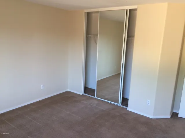 an empty room with closet
