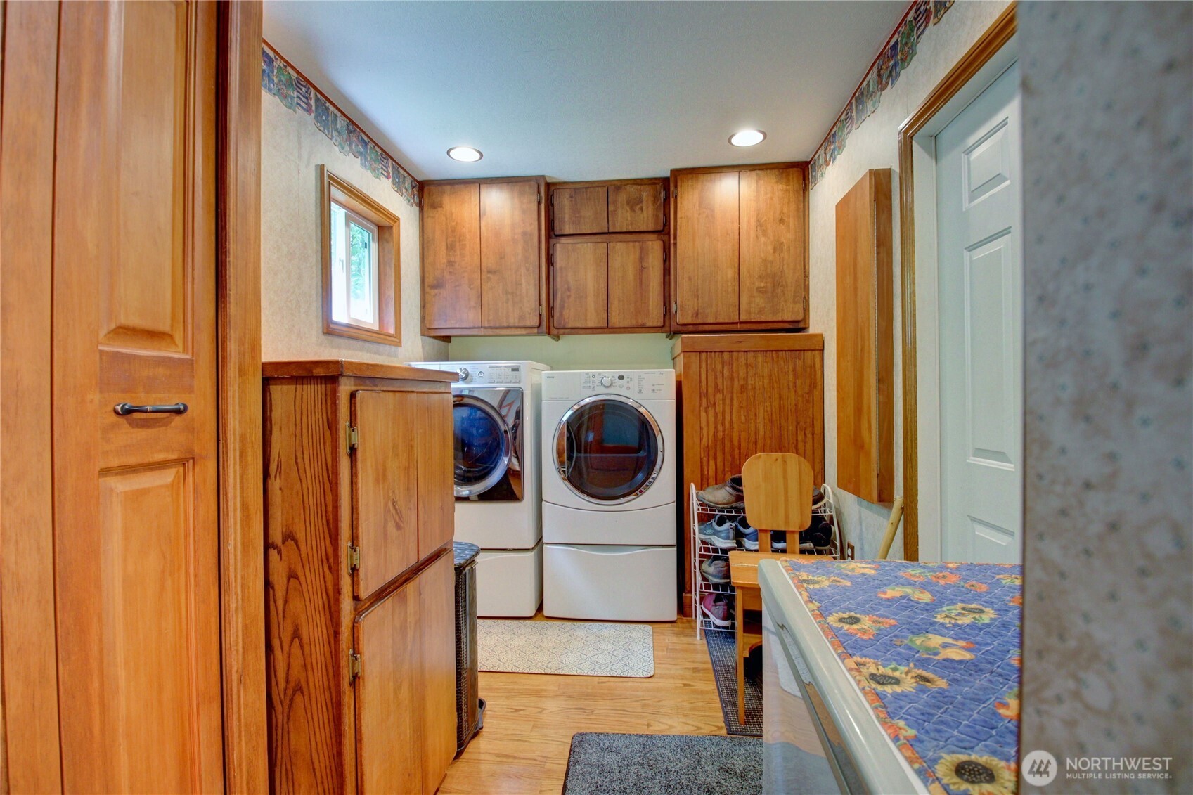 2909 Overpass Road Bow, WA 98232 - Photo 22 of 40 a kitchen with stainless steel appliances granite countertop a refrigerator and a stove top oven