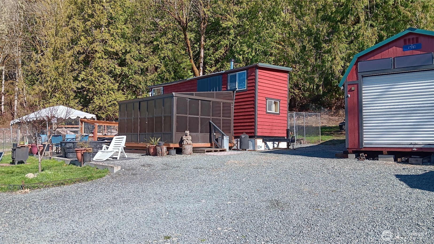 47367 State Rte 20 Concrete, WA 98237 - Photo 1 of 15 a view of a house with backyard and sitting area