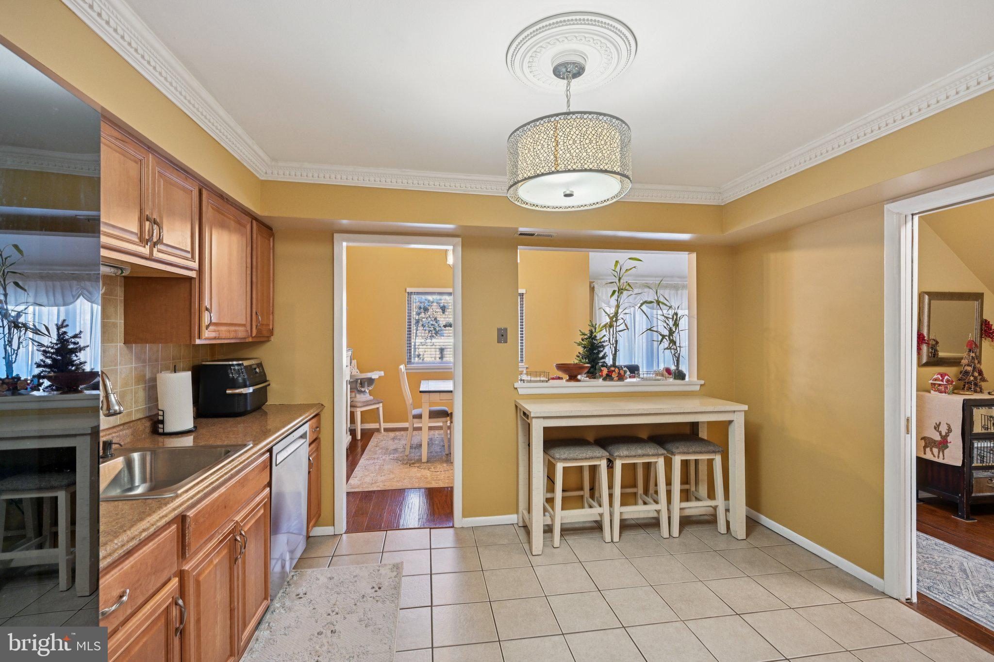 18 Jacob Court Trenton, NJ 08628 - Photo 19 of 43 a kitchen with stainless steel appliances granite countertop a stove and cabinets