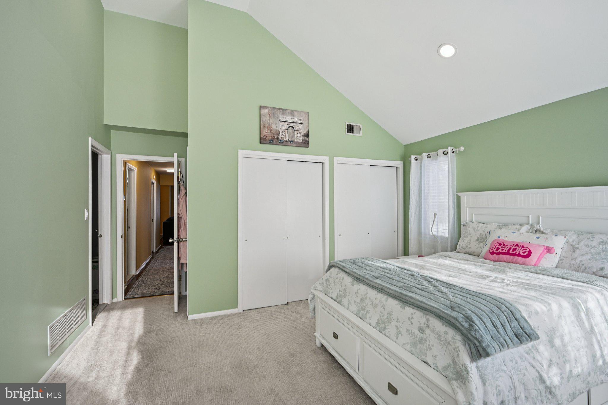 18 Jacob Court Trenton, NJ 08628 - Photo 21 of 43 a bedroom with a bed and a refrigerator