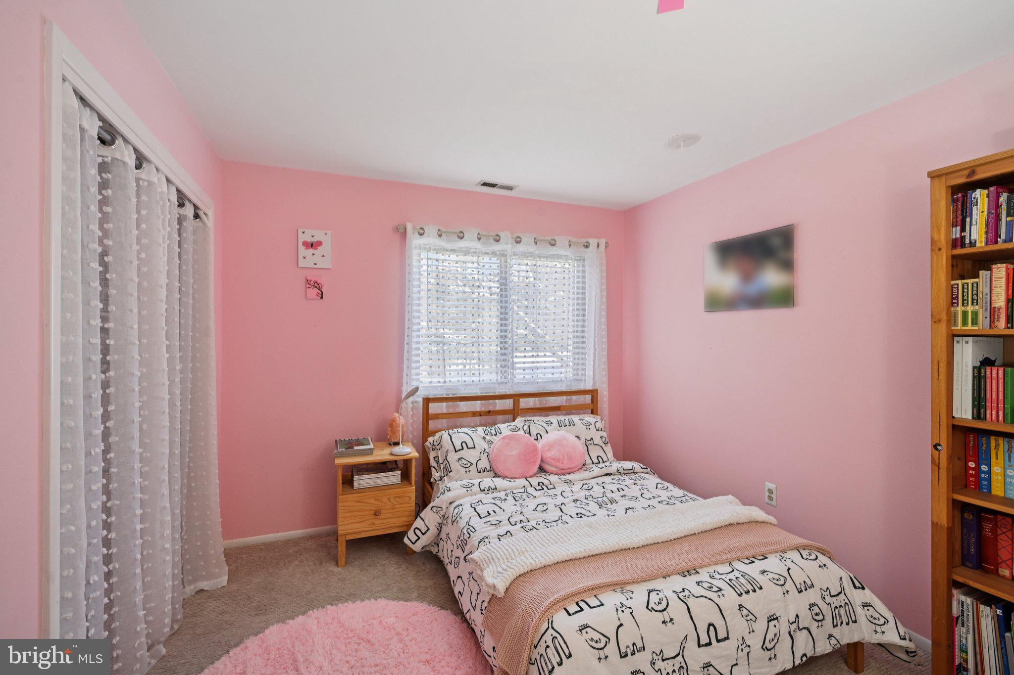 18 Jacob Court Trenton, NJ 08628 - Photo 22 of 43 a bedroom with a bed and a window