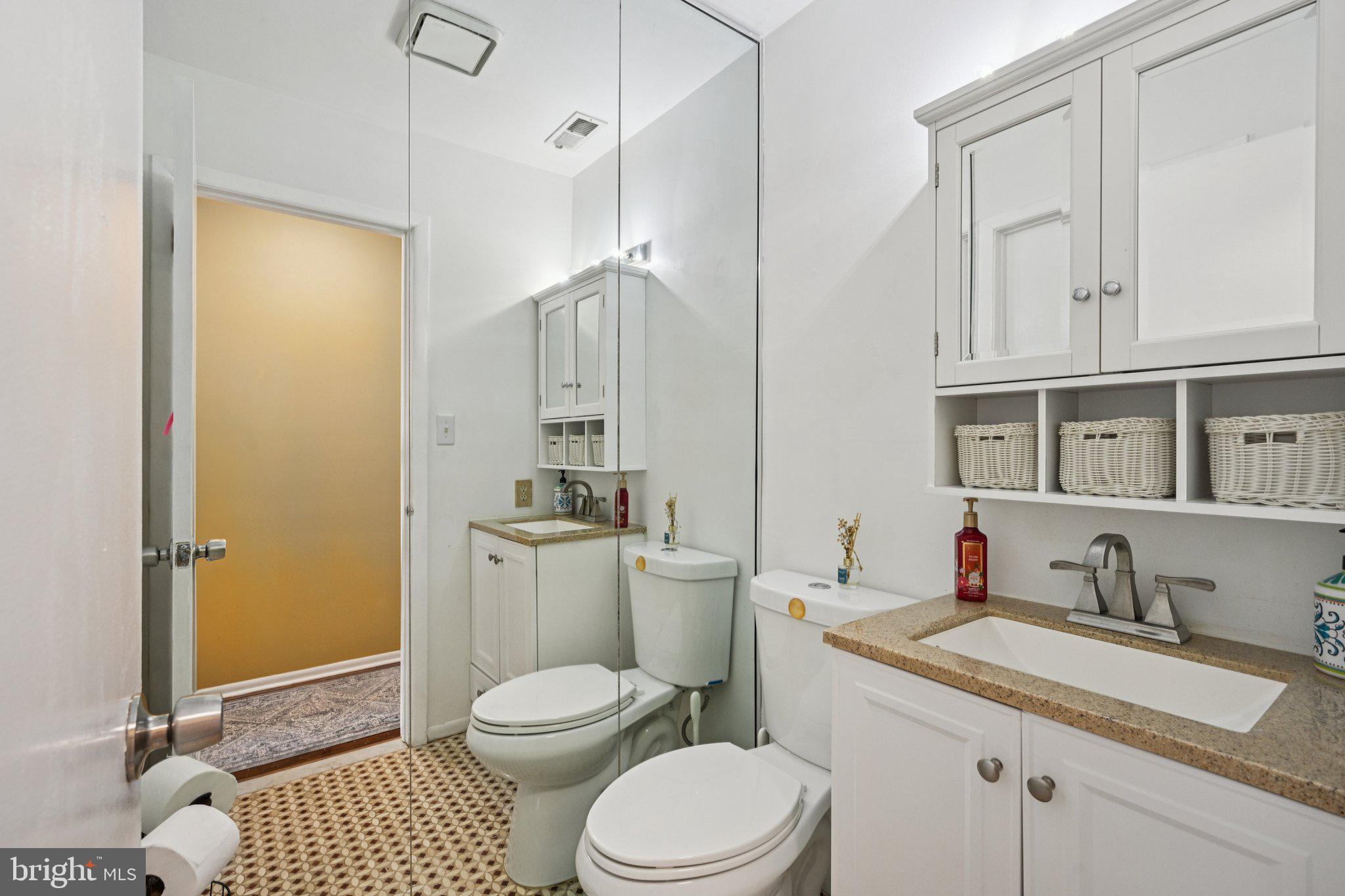 18 Jacob Court Trenton, NJ 08628 - Photo 24 of 43 a bathroom with a granite countertop toilet sink and shower