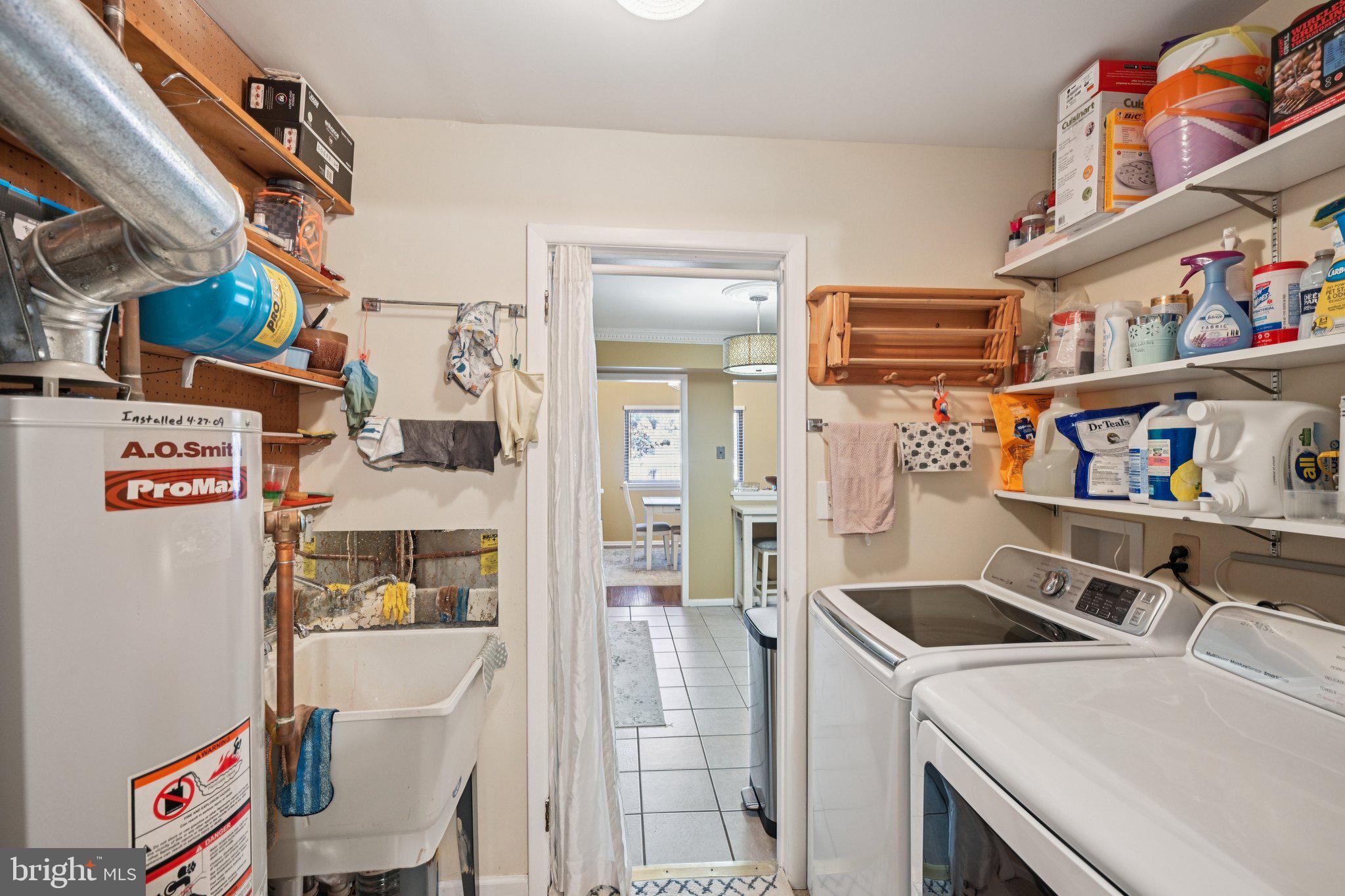 18 Jacob Court Trenton, NJ 08628 - Photo 29 of 43 a utility room with dryer and washer