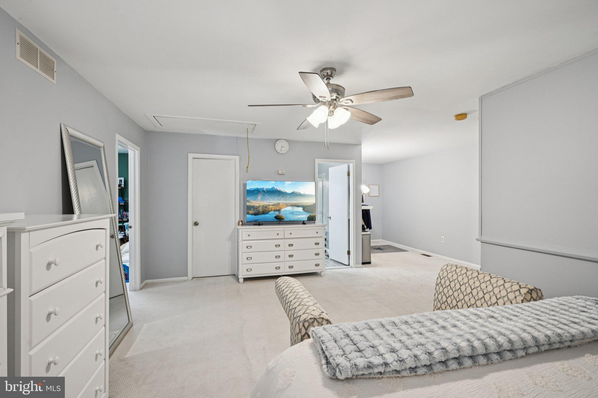 18 Jacob Court Trenton, NJ 08628 - Photo 31 of 43 a living room with furniture and a flat screen tv