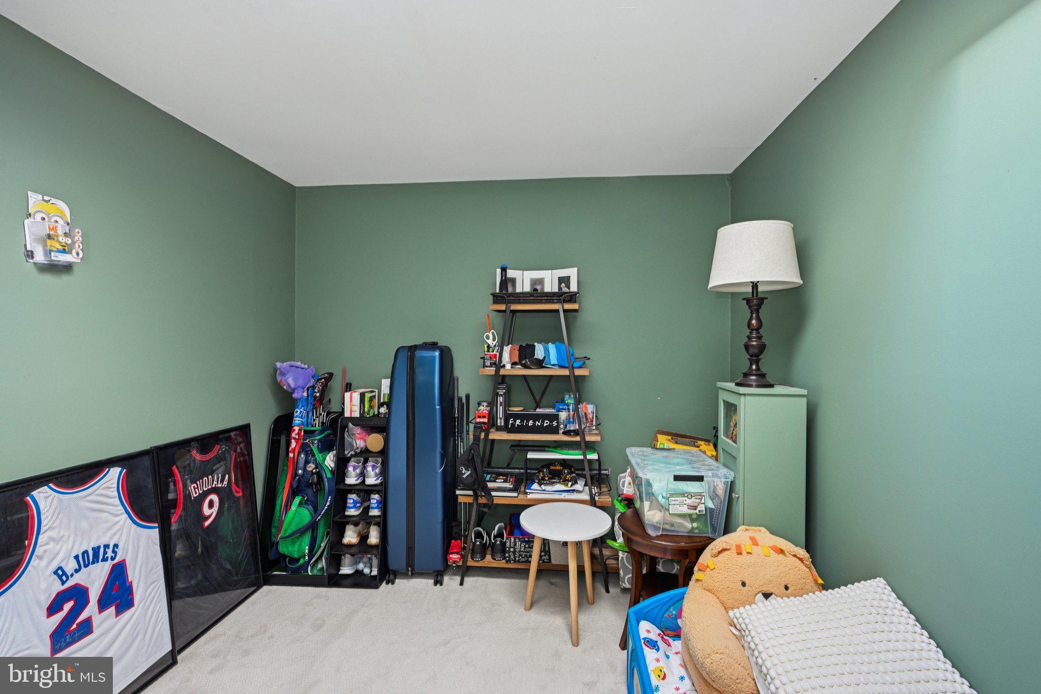 18 Jacob Court Trenton, NJ 08628 - Photo 37 of 43 a bedroom with furniture and a book shelf