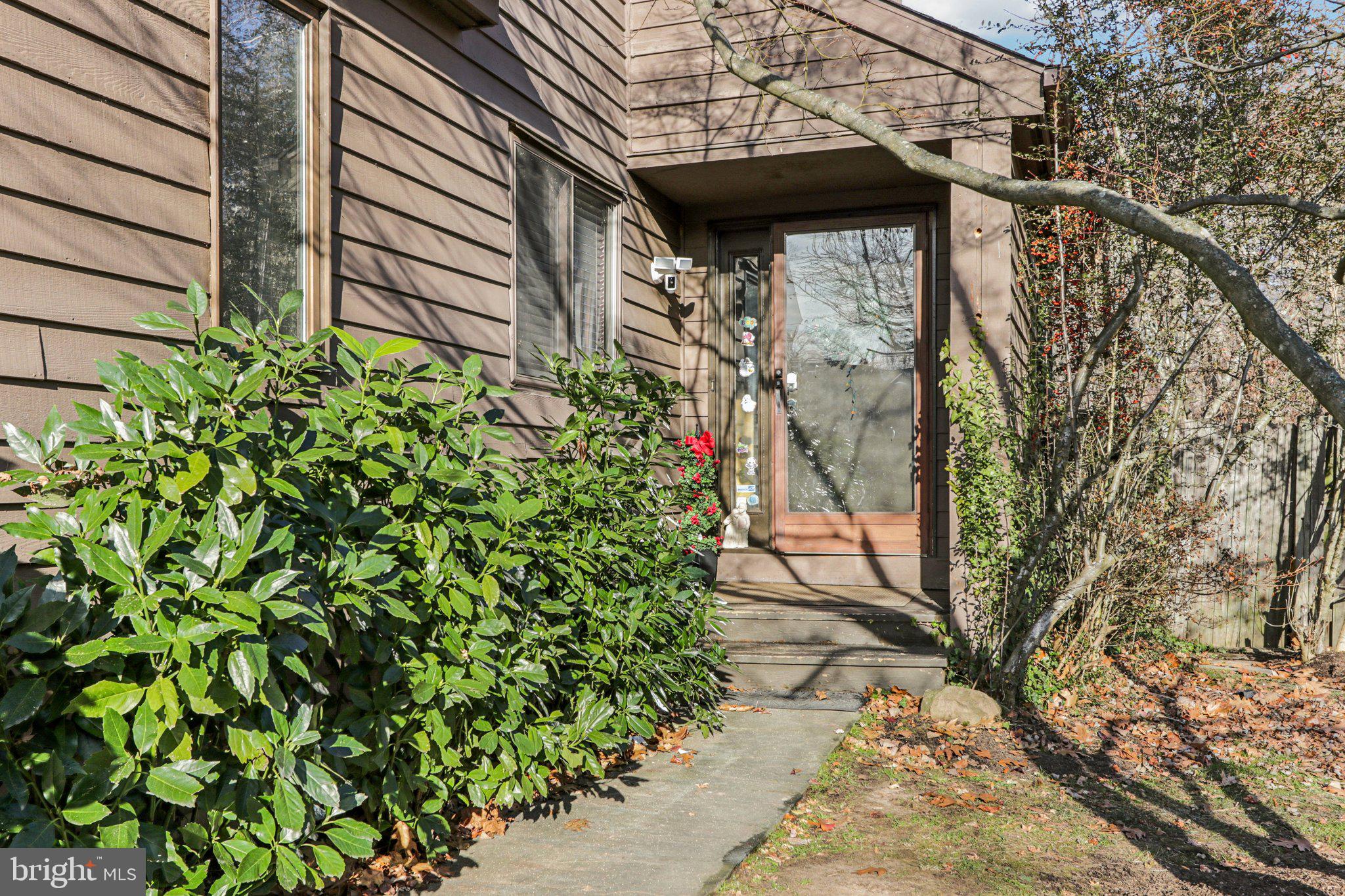 18 Jacob Court Trenton, NJ 08628 - Photo 5 of 43 a view of a pathway of a house with a yard