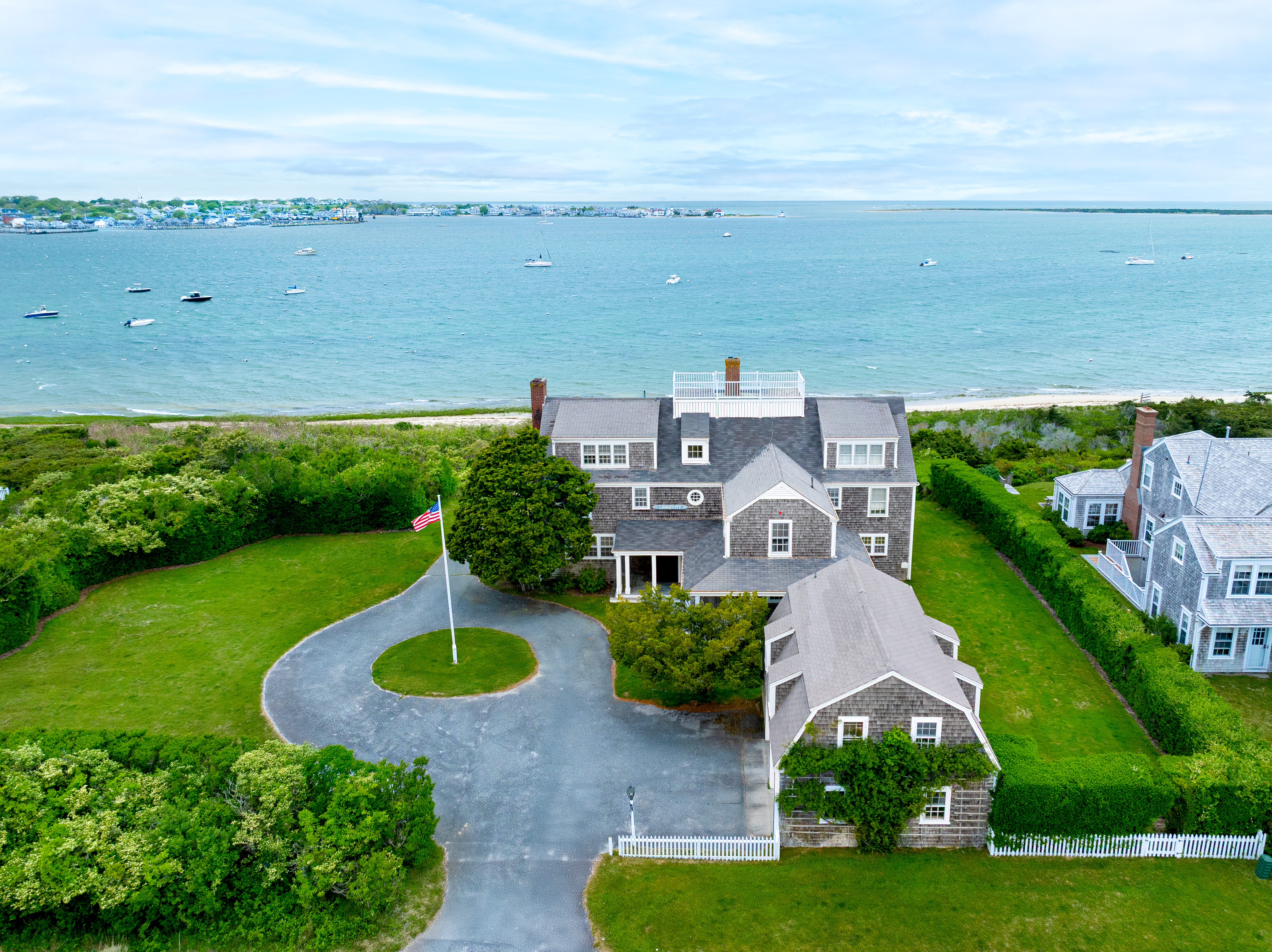 52 Monomoy Road Nantucket, MA 02554 - Photo 3 of 5 an aerial view of a house with a garden