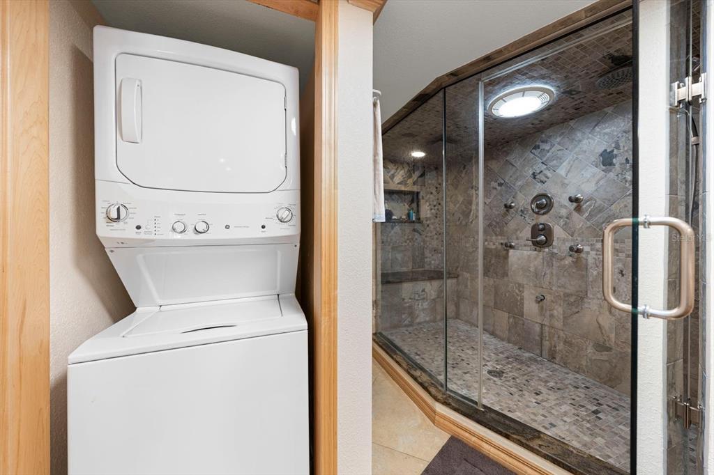 506 Gulf Boulevard, Unit 201 Indian Rocks Beach, FL 33785 - Photo 19 of 30 a bathroom with a shower