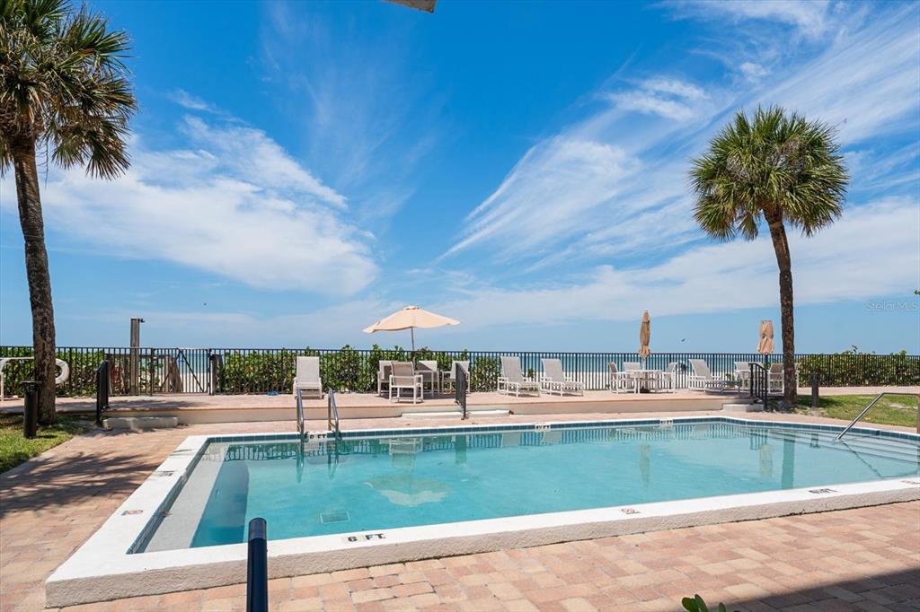 506 Gulf Boulevard, Unit 201 Indian Rocks Beach, FL 33785 - Photo 26 of 30 a view of swimming pool with a patio