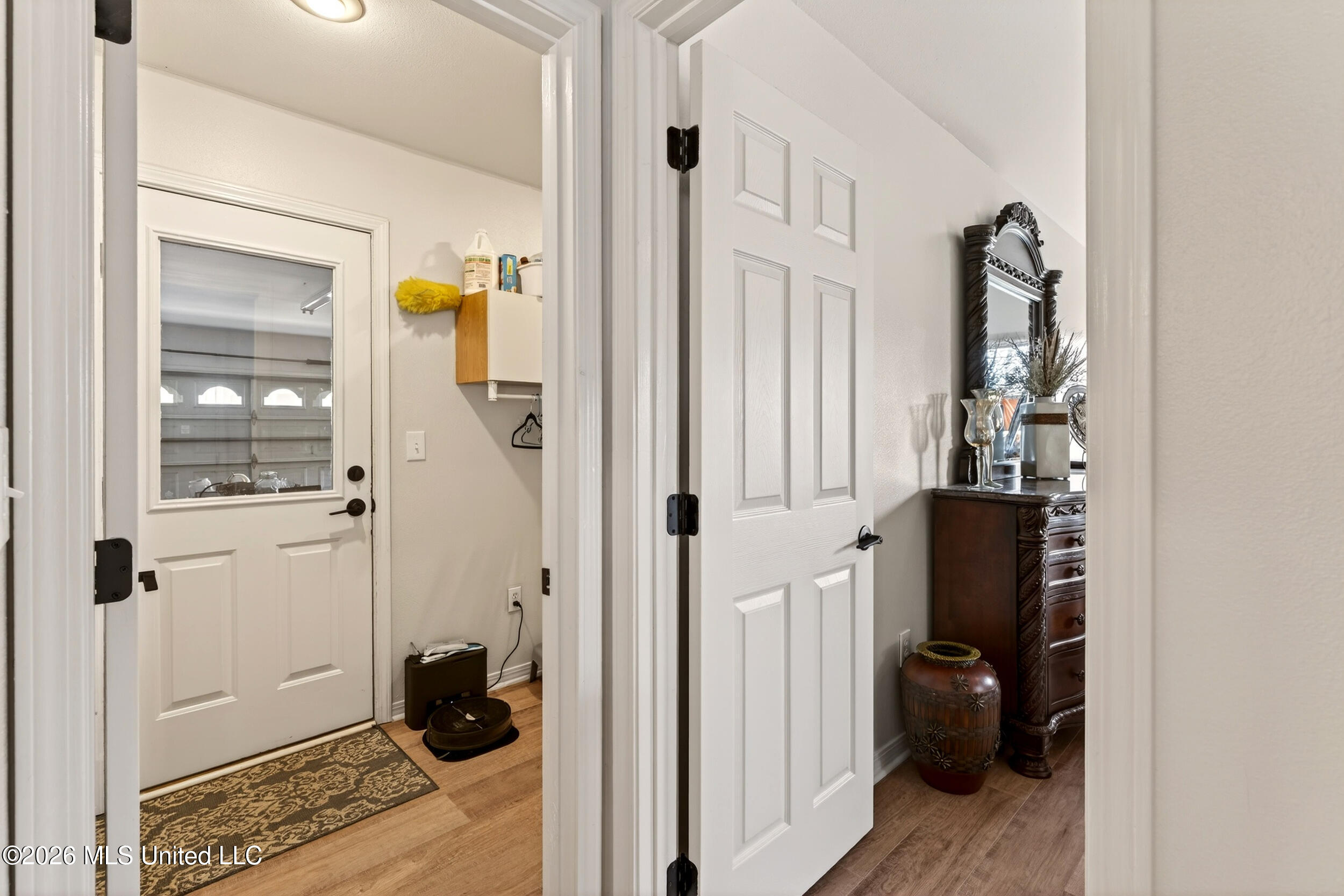 885 Manini Way Diamondhead, MS 39525 - Photo 27 of 55 26_hall to laundry and master