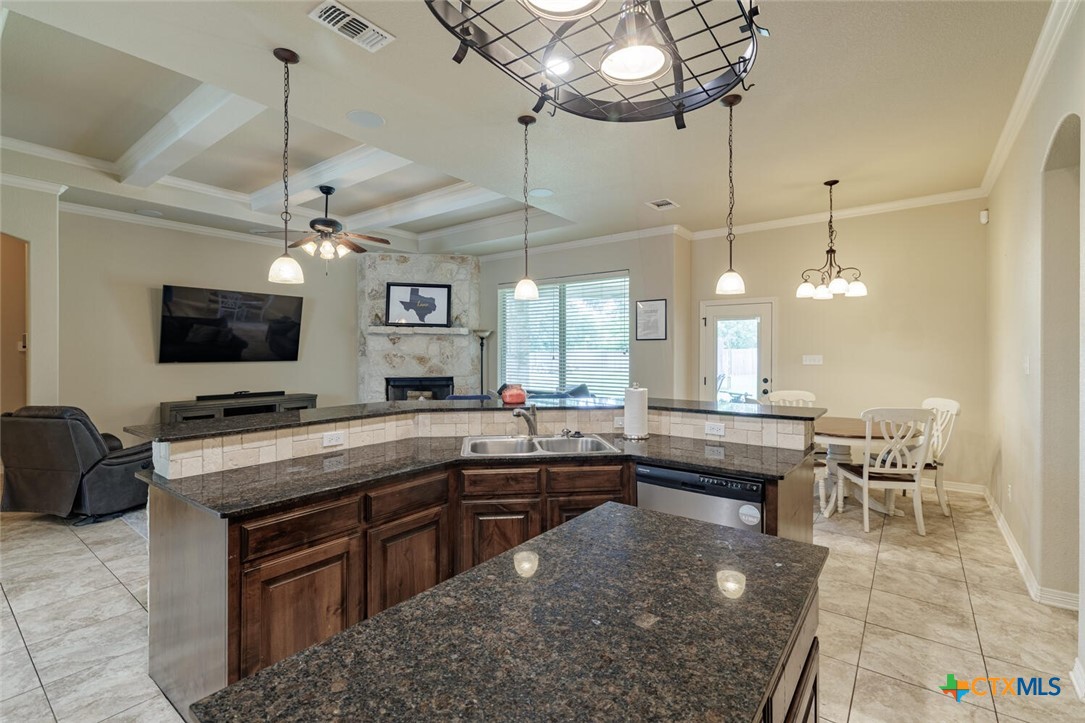 910 Ridgeoak Drive Belton, TX 76513 - Photo 21 of 48 a large kitchen with a table and chairs in it
