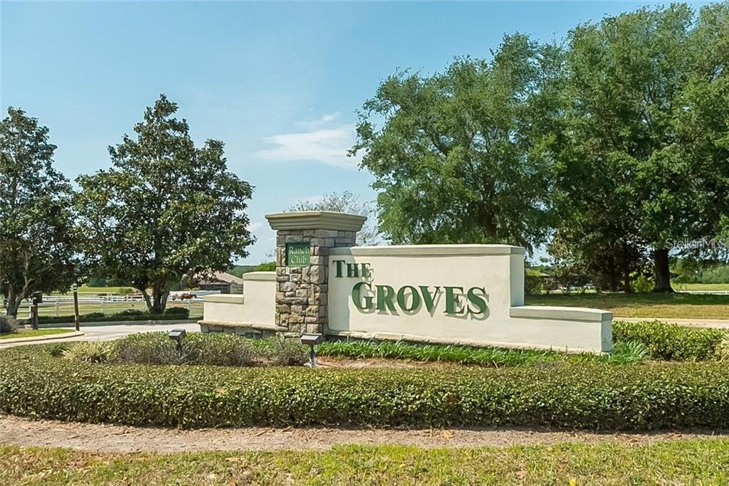 6 Eagle Run Groveland, FL 34736 - Photo 1 of 18 a sign on the side of a building